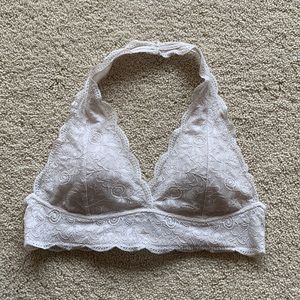 White lace bralette (goes around the neck with an open back)